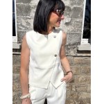Boléro sans manches avec boutons dorés – Accessoire tailleur chic | Melle Jeanne