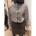 Jupe courte en velours côtelé avec volants et boutons - Style chic et féminin