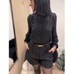 Blouse noire à pois col montant manches bouffantes | Melle Jeanne