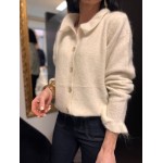 Gilet blanc avec volants aux manches et petit col | Élégance féminine