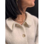 Gilet blanc avec volants aux manches et petit col | Élégance féminine