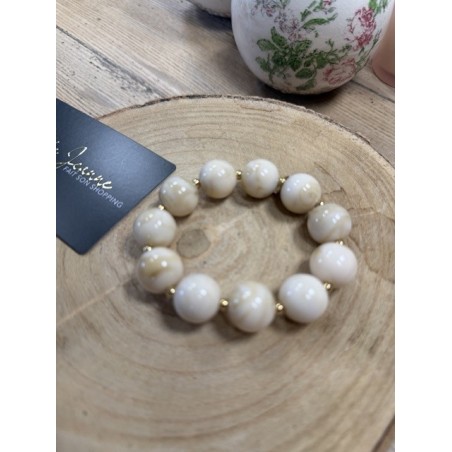 Bracelet boules beige en acier inoxydable – Élégance délicate
